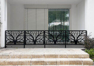 Contemporary Outdoor Fence with Decorative Branch Pattern